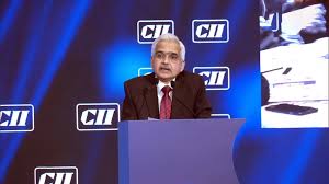 CII President speaking at an economic conference praising RBI policy success