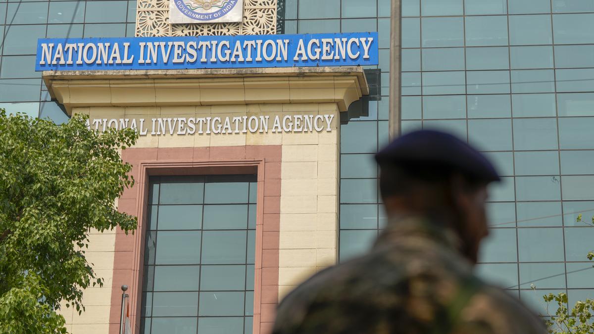 Two accused being escorted by NIA officials in custody extension hearing (Stock image)