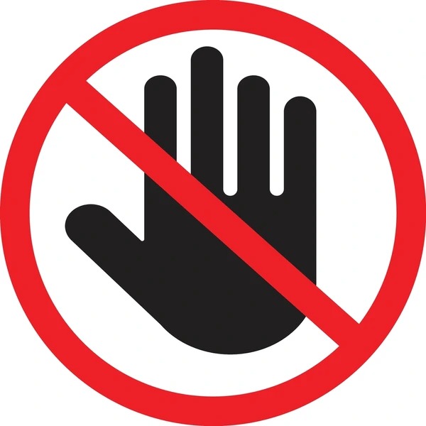 Indian man placing a lock on a glass jar labeled ‘Do Not Touch – Savings’