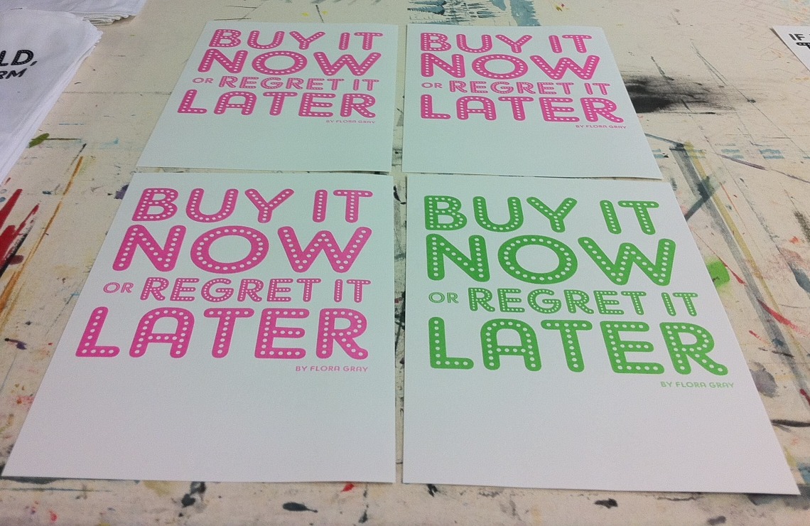 Indian shopper looking at a flash sale on mobile with credit card in hand, confused