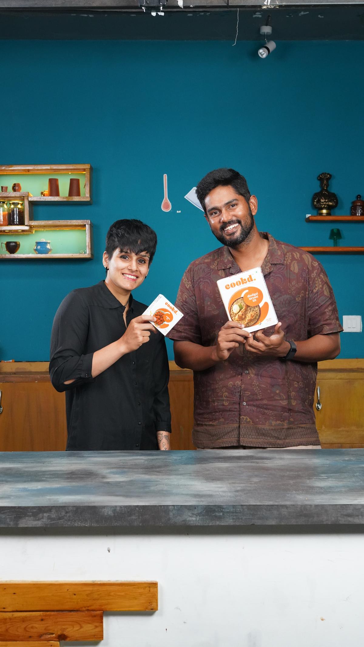 Cookd home-cooking startup team celebrating funding success