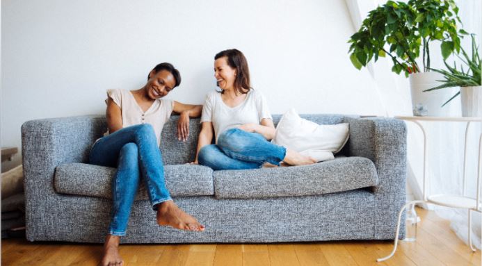 "Couple having a financial discussion at home, planning their shared budget"