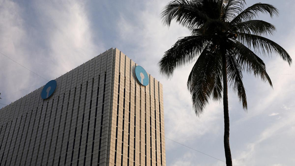 State Bank of India logo with share sale announcement and rupee financial chart