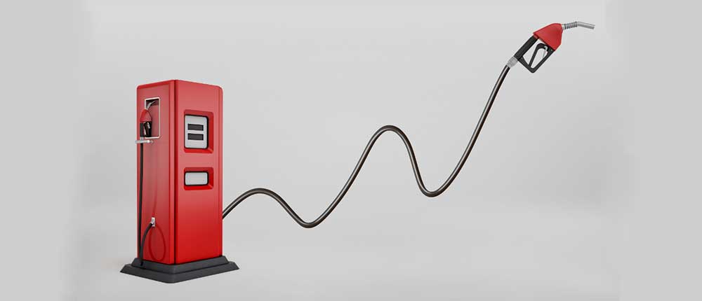 A fuel gauge near empty with rupee notes, symbolizing rising oil prices affecting household budget – Vizzve Finance