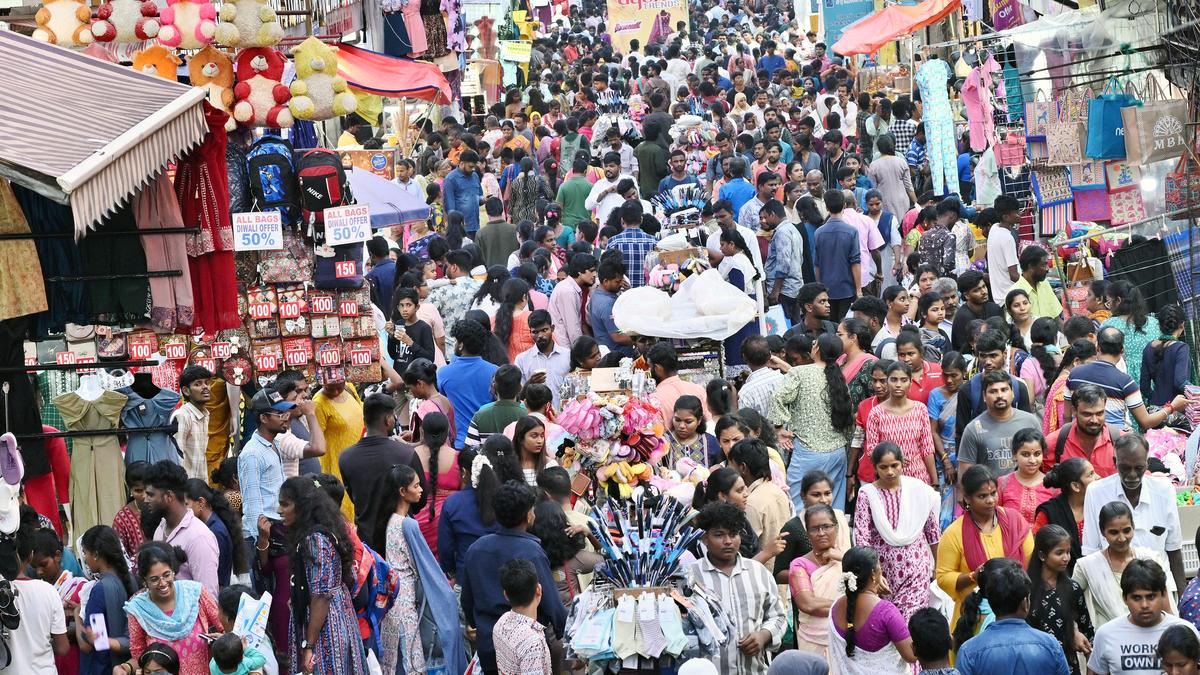 “India population density map with rising graph and people icons, symbolizing demographic transition”