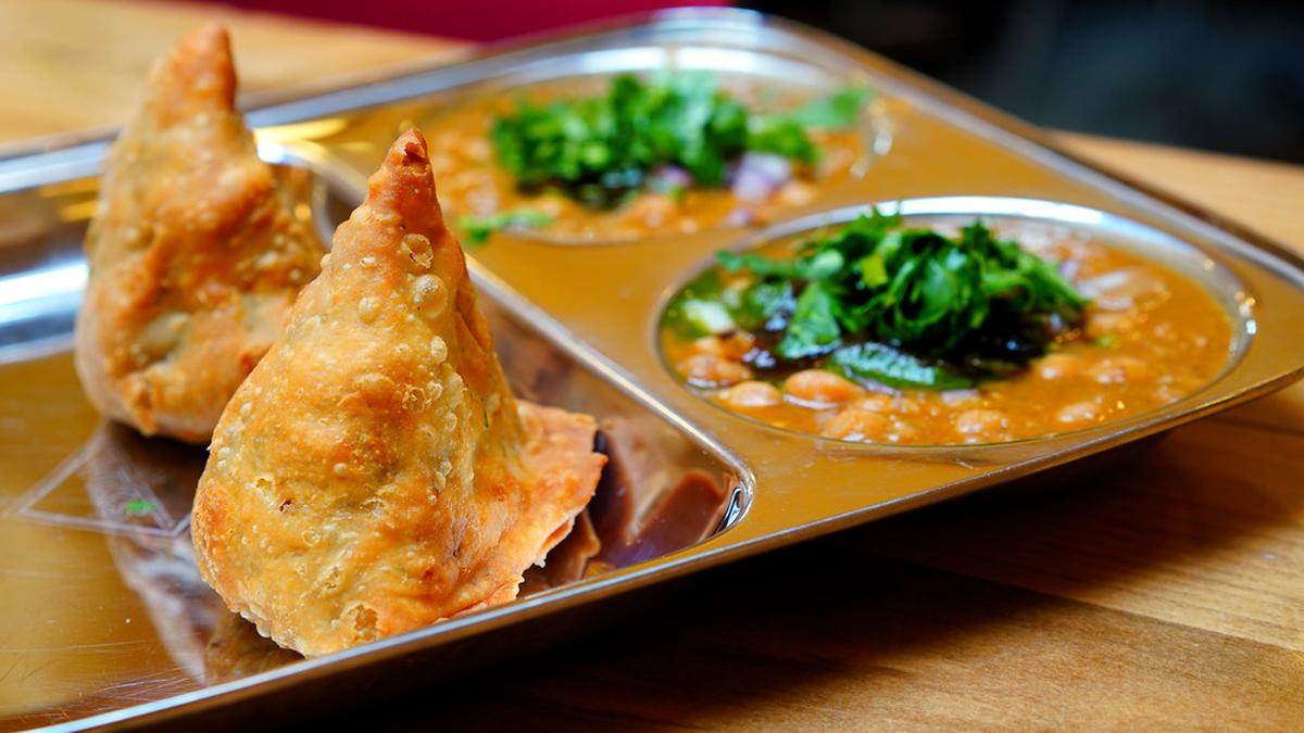 Samosa with nutritional warning board on sugar and fat – Vizzve Finance coverage