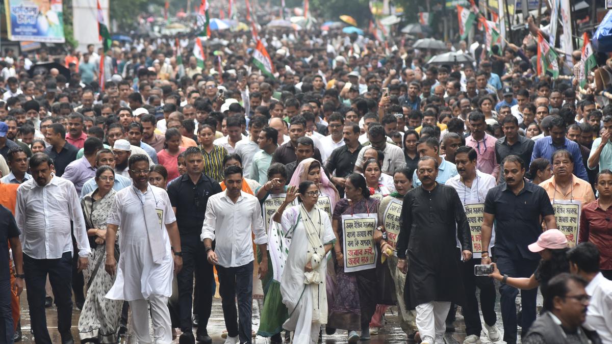 Mamata Banerjee leading protest march in Kolkata against BJP policies