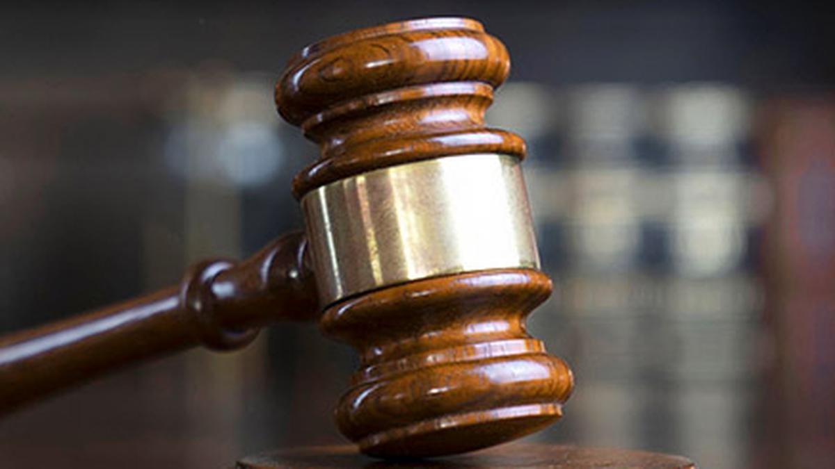 rohini-court-white-shirt-black-pants-ban