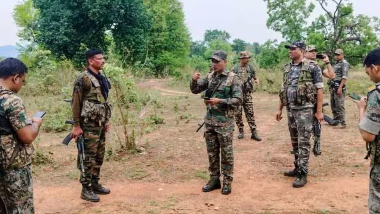 Security forces arresting Maoist cadres in Jharkhand forest operation