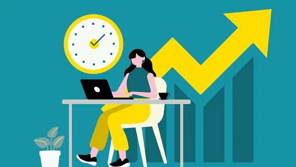 Indian woman calculating savings and investments on a table with financial papers