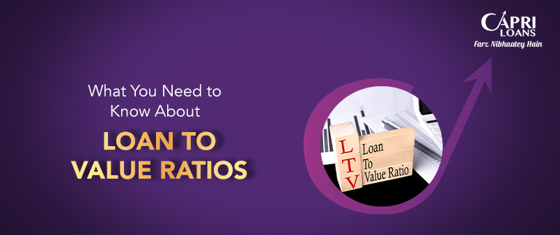 Jewellery with gold coins and a calculator depicting gold loan calculation and loan-to-value ratio