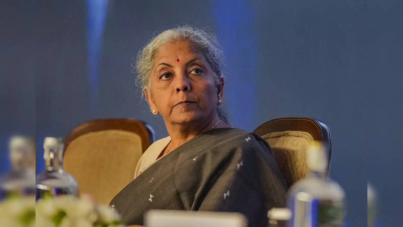 Central government employees reviewing pension scheme documents as part of UPS enrolment in 2025