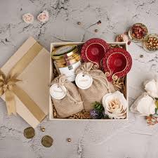 A cozy table setup with a small cake, candles, handwritten card, and fairy lights — perfect for an intimate celebration under ₹1,000.