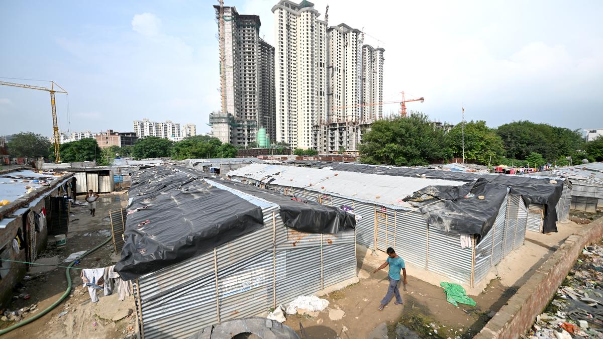 Bengali migrants in Gurugram’s service lanes looking anxious during police verification