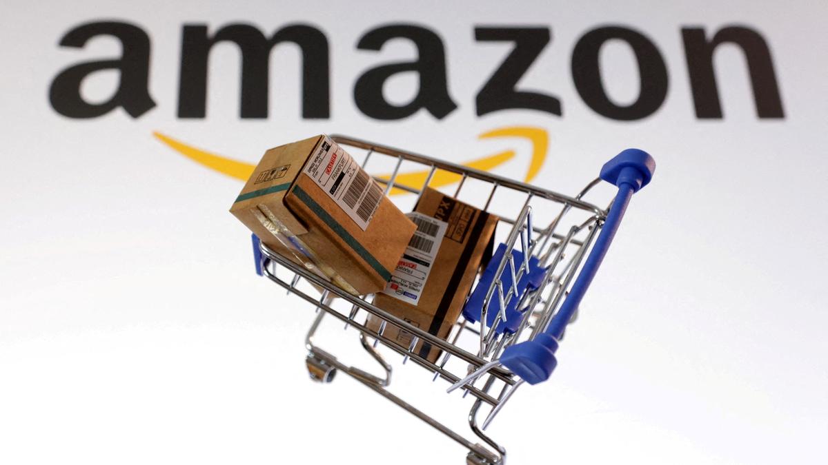 Amazon logo with fluctuating stock chart illustrating profit surge and share price drop