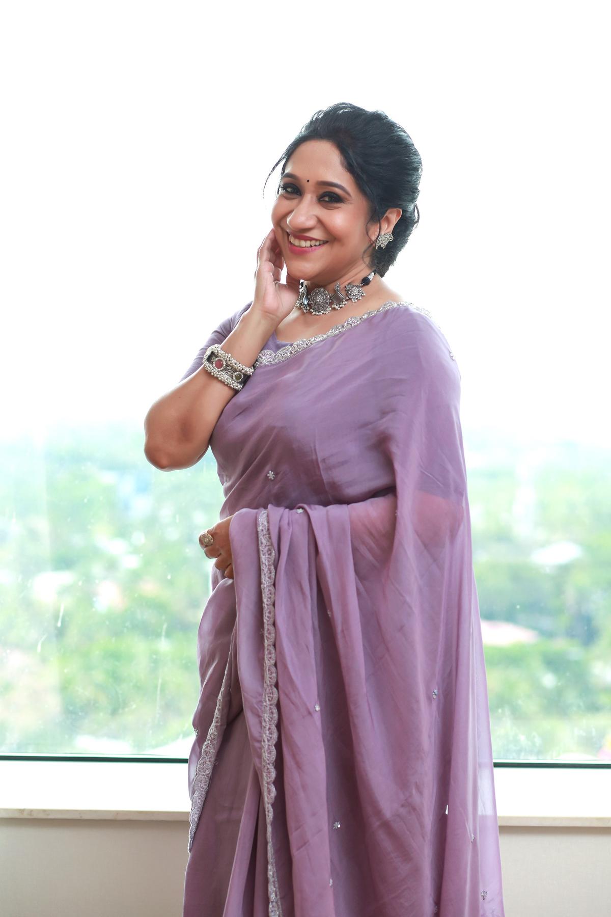 Sujatha Mohan performing on stage, celebrating five decades of a successful singing career