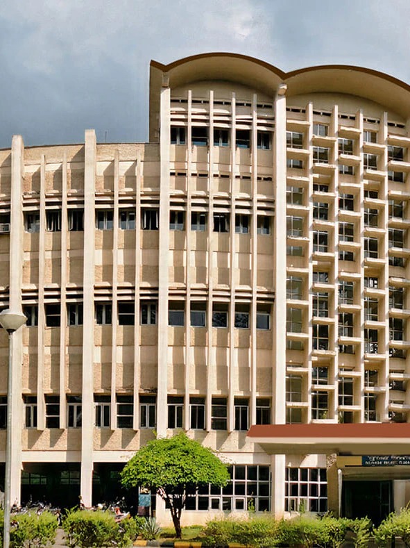 IIT Bombay hostel with police and students gathered outside