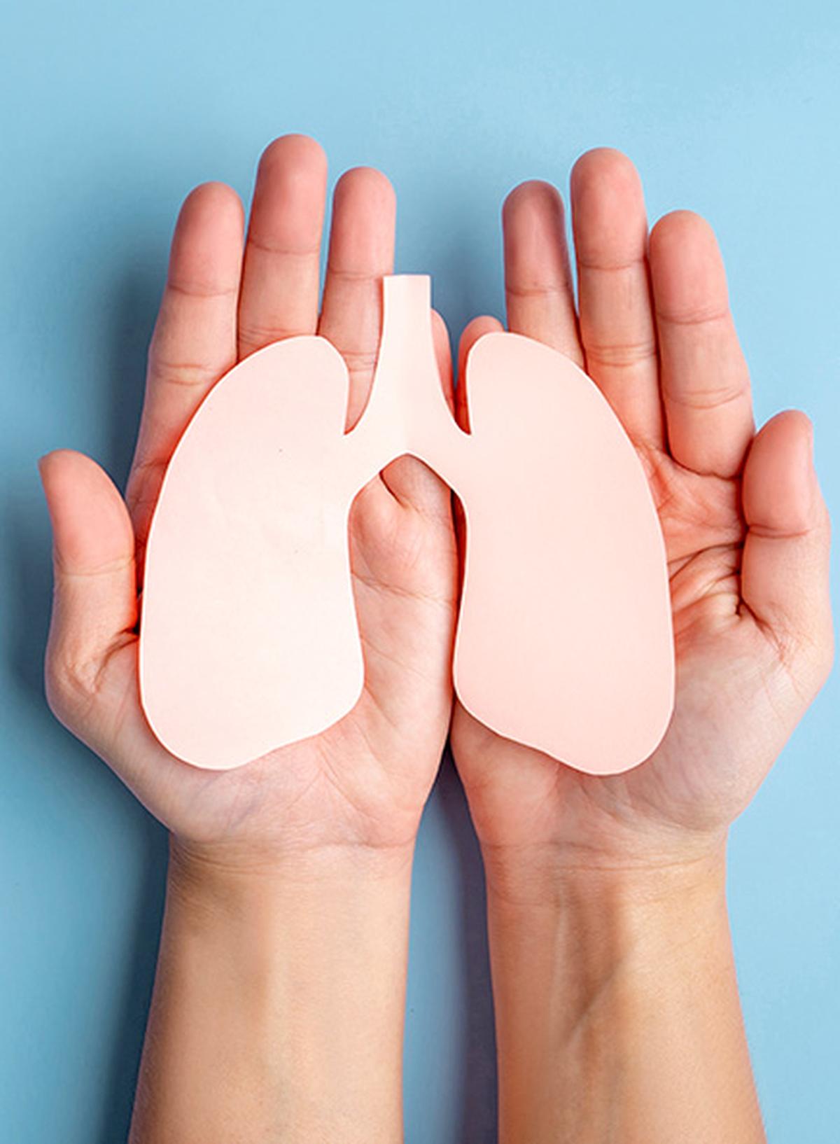 Healthcare professional educating patients about lung cancer screening and early detection methods