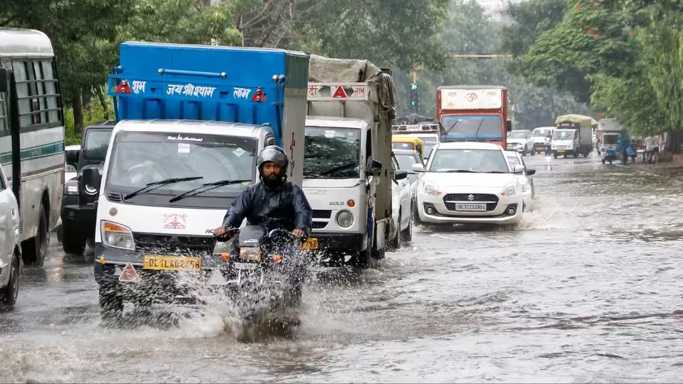 Heavy monsoon rain in an Indian city during August 2025 with flooded roads and cloudy skies
