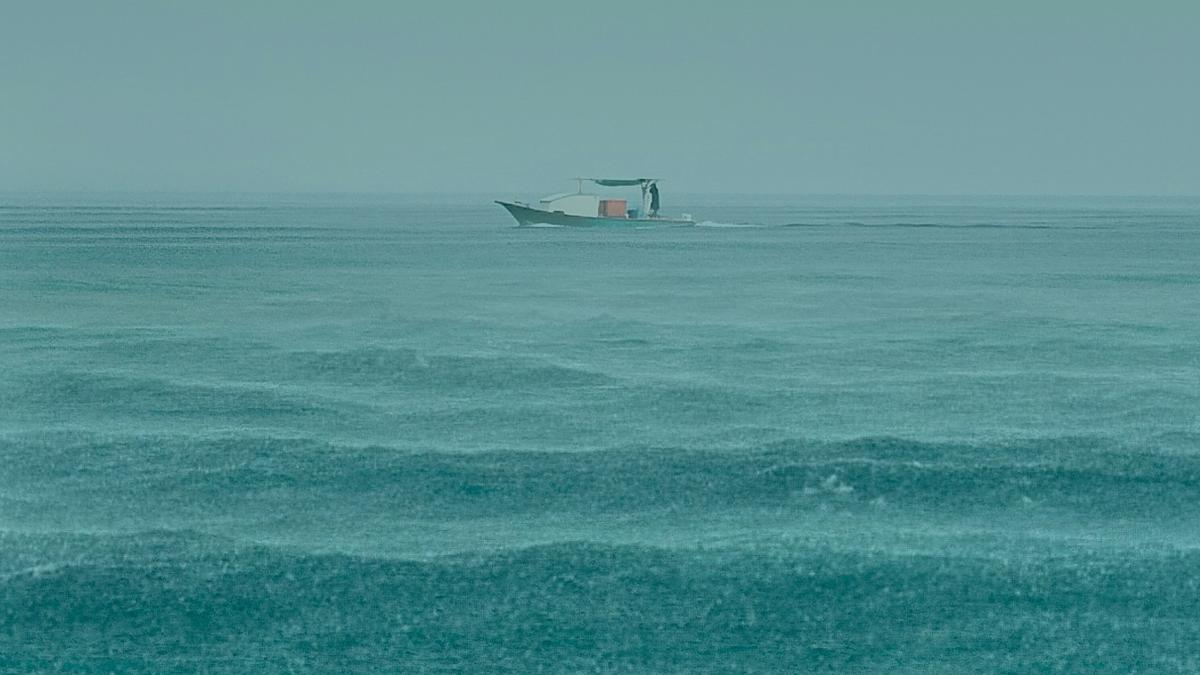 Illustration of tropical rain falling lightly on ocean surface causing destabilisation of upper ocean layers, based on recent scientific study