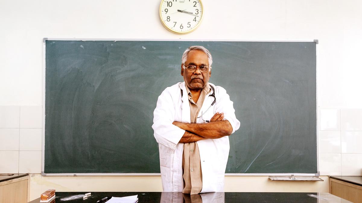Indian medical college classroom with faculty member teaching students, highlighting concerns over clinical teaching standards with distance Ph.D. and non-MBBS appointments