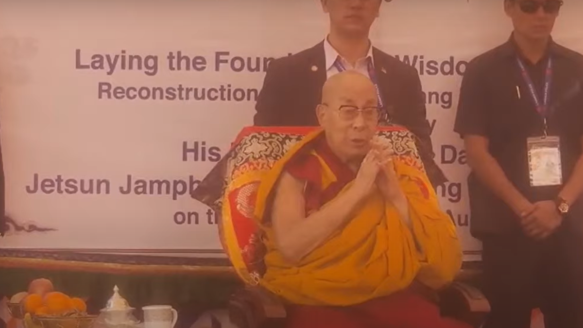 His Holiness the Dalai Lama laying the foundation stone of Chowkhang Vihara monastery in Leh, Ladakh, surrounded by devotees and monks during a spiritual ceremony in 2025