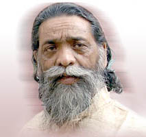 Shibu Soren in traditional attire addressing a public gathering