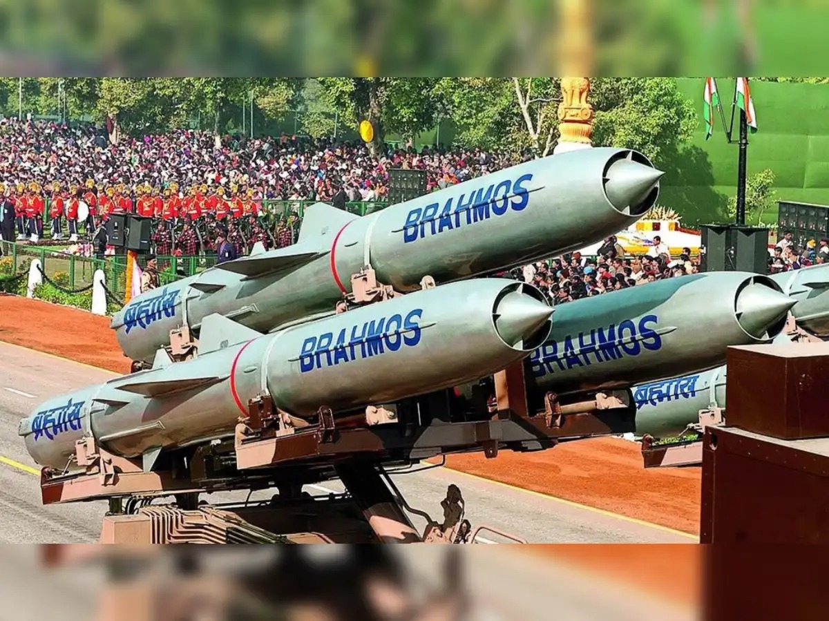 BrahMos missile launch during a defense operation with aircraft and naval ship