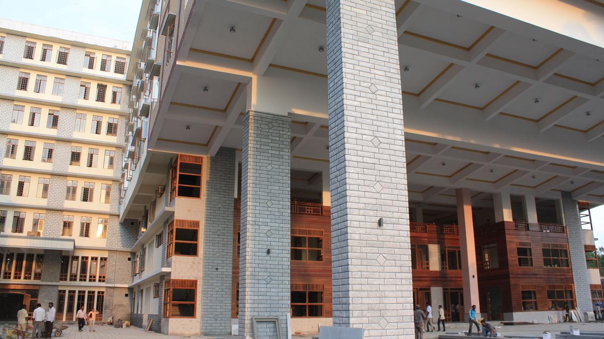 Traders attending a ‘Know GST’ awareness workshop in Bengaluru with officials explaining GST and UPI transaction regulations