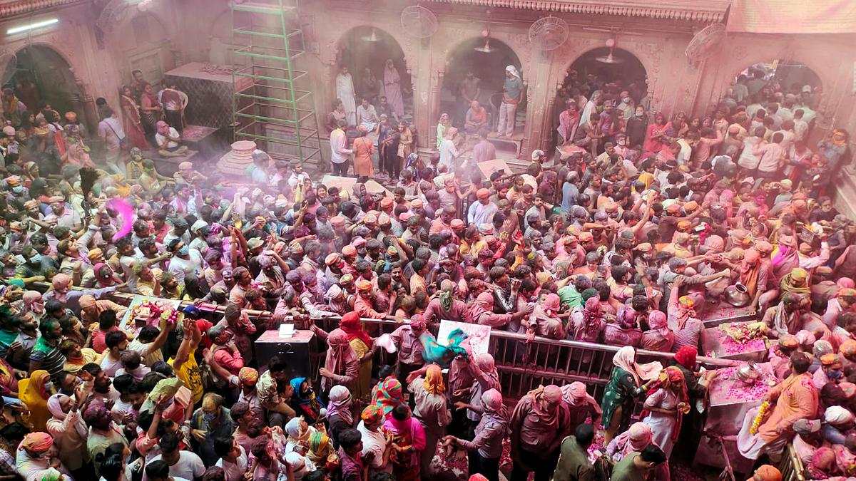 Supreme Court building with legal activity representing the judicial scrutiny of Banke Bihari Temple management ordinance by Uttar Pradesh government