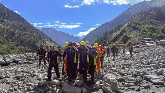 Rescue teams evacuating flood-affected residents in Uttarkashi, Uttarakhand