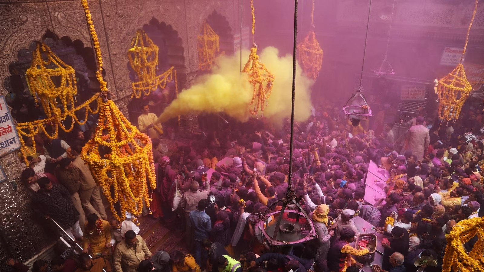 Banke Bihari Temple in Vrindavan with devotees during a religious ceremony