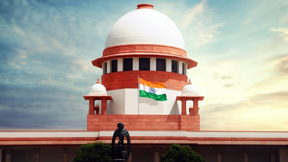 Front view of the Supreme Court of India under clear sky, symbolizing justice and legal rulings.