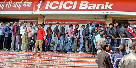ICICI Bank branch with customers standing outside