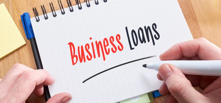 Business owner managing seasonal demand with help of Vizzve Finance business loan
