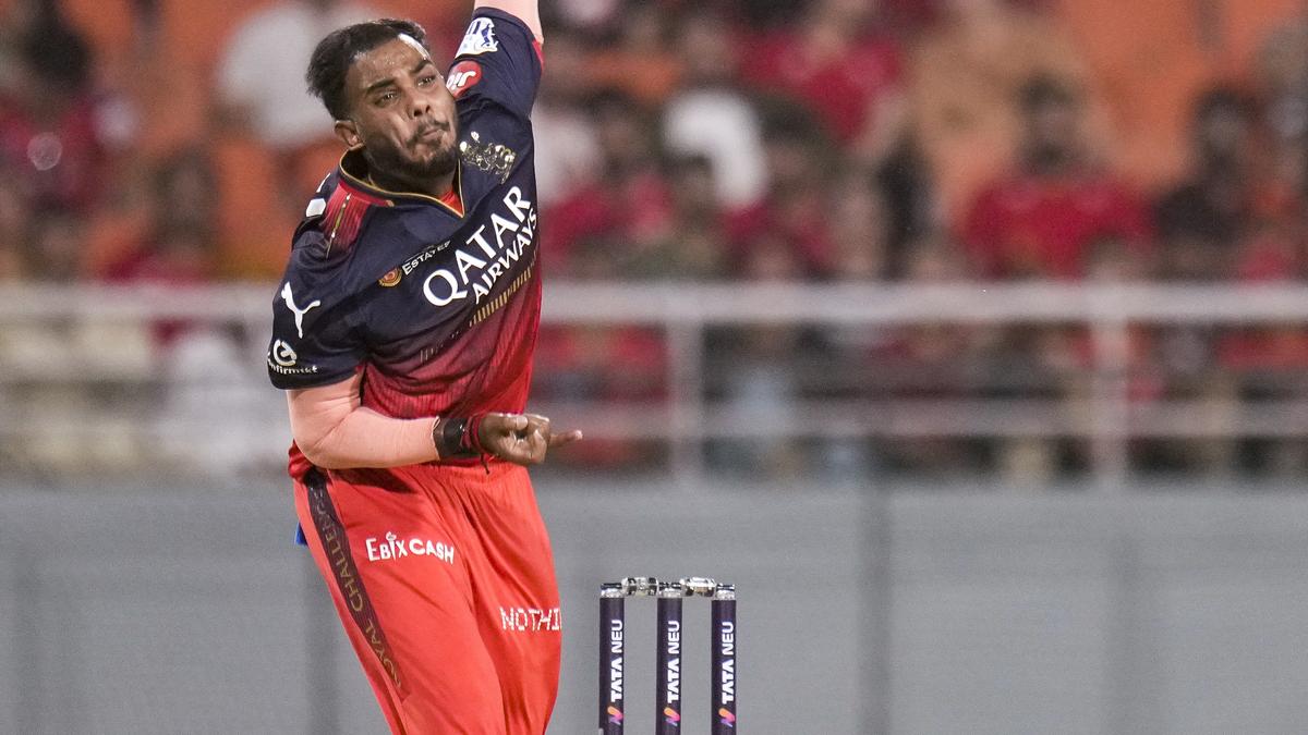 Yash Dayal walking off the cricket field, representing the controversy surrounding the sexual exploitation case