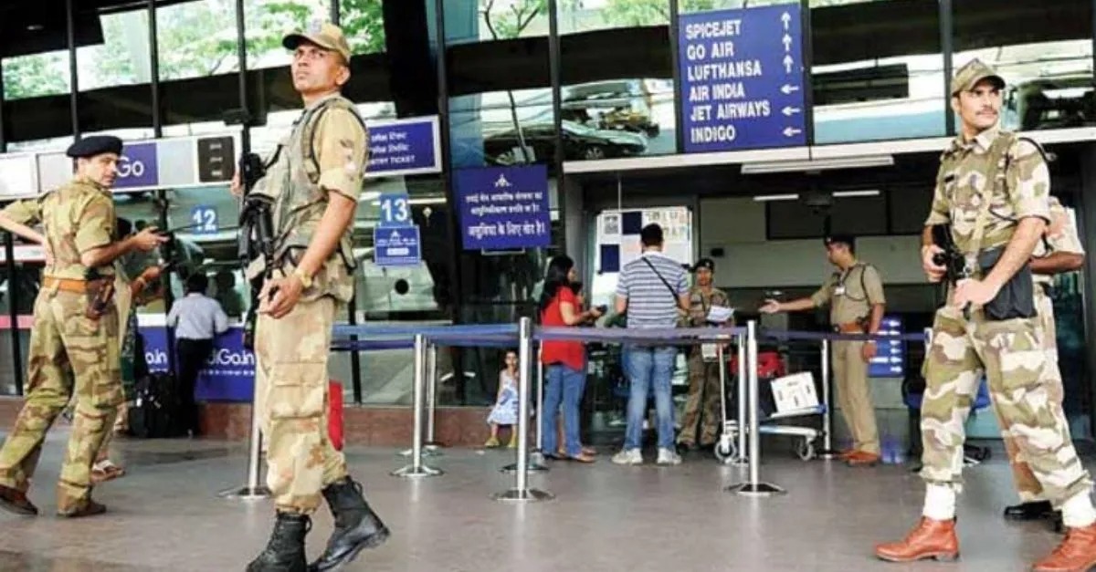 CISF personnel checking bags at Delhi Metro station ahead of Independence Day celebrations.