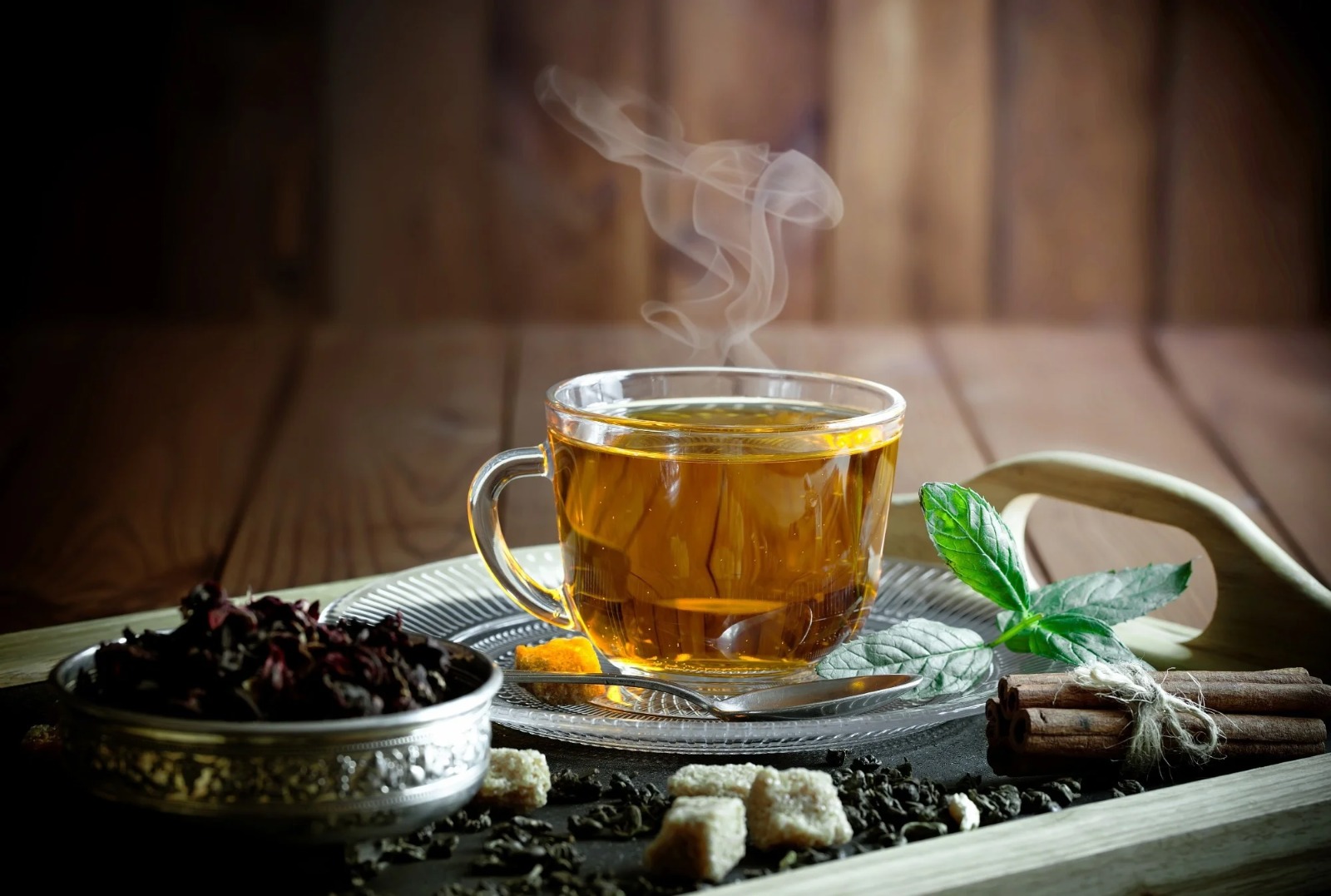 Healthy professional drinking herbal tea to boost immunity during seasonal change
