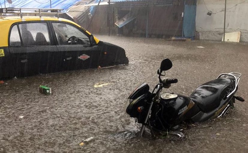 Vehicles stuck in waterlogged roads during Mumbai rains
