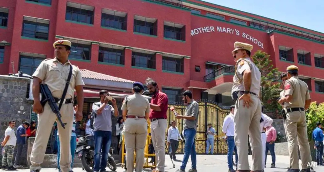 Delhi school evacuation with police and bomb disposal teams during a bomb threat.