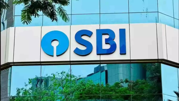 SBI bank building with text showing MCLR rate reduction
