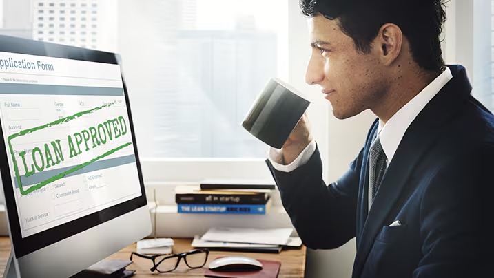 Business owner preparing documents for loan approval