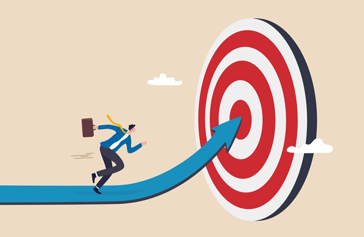 Young professional holding a graduation cap funded by Vizzve loan