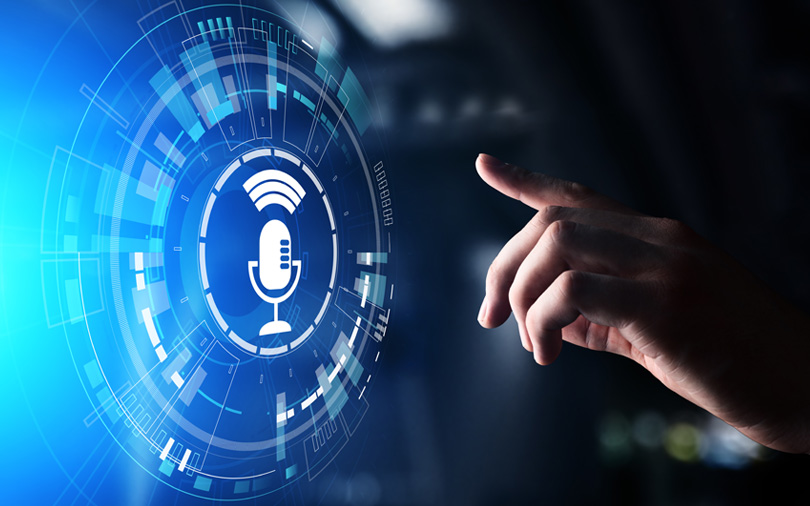 User applying for a loan through voice banking on smartphone