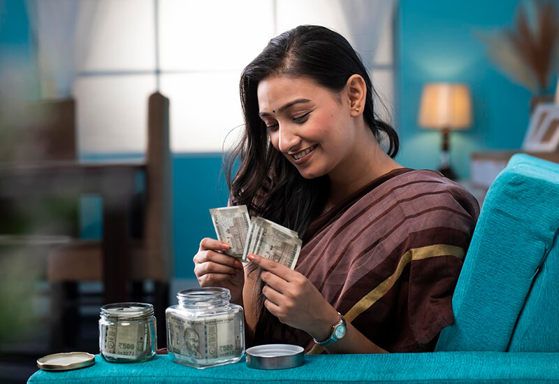 Woman entrepreneur using microfinance loan for small business