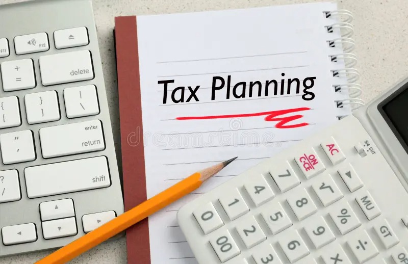 Tax planning concept with calculator and documents