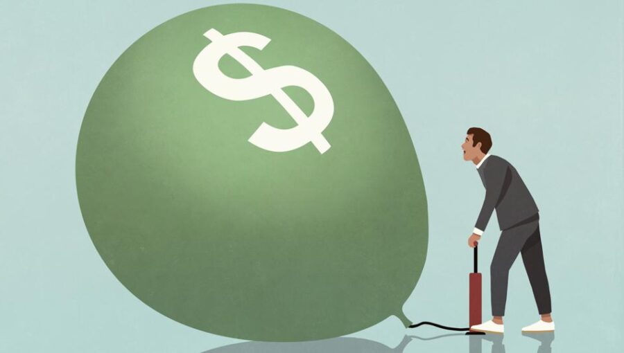 Person reviewing personal finance and budgeting charts amid inflation