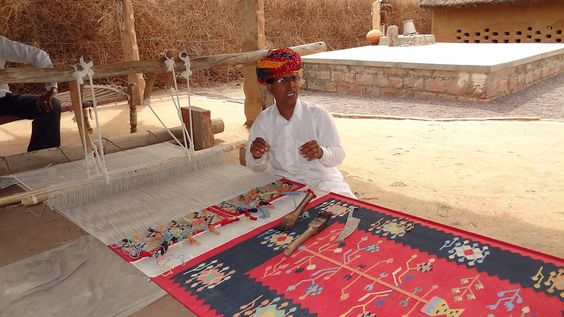 Rajasthani artisan weaving traditional fabric supported by Vishwakarma Scheme loan