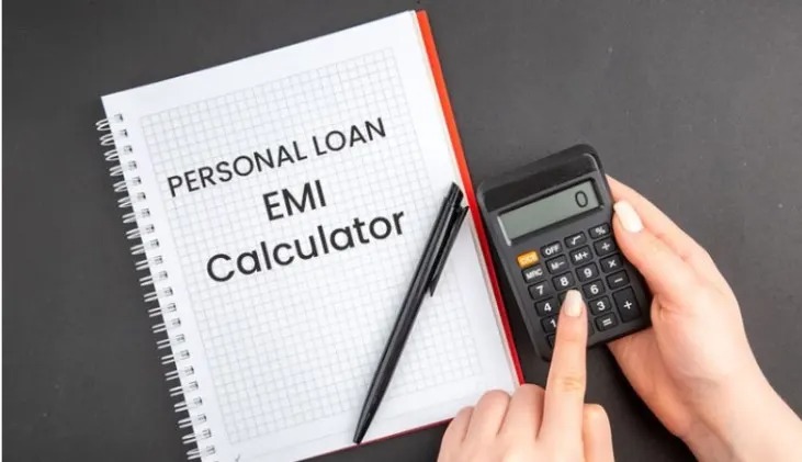 Borrower planning loan repayment with calculator