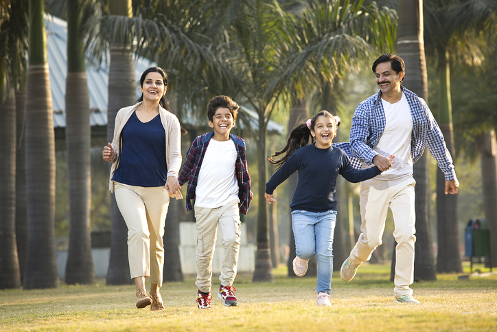 Happy family with health insurance coverage in India